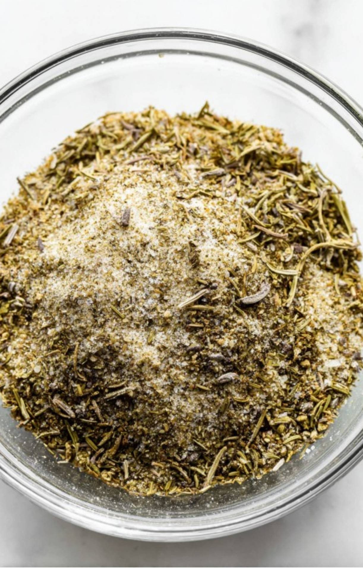 A bowl filled with homemade herb and spice rub, the perfect seasoning for sirloin tip roast