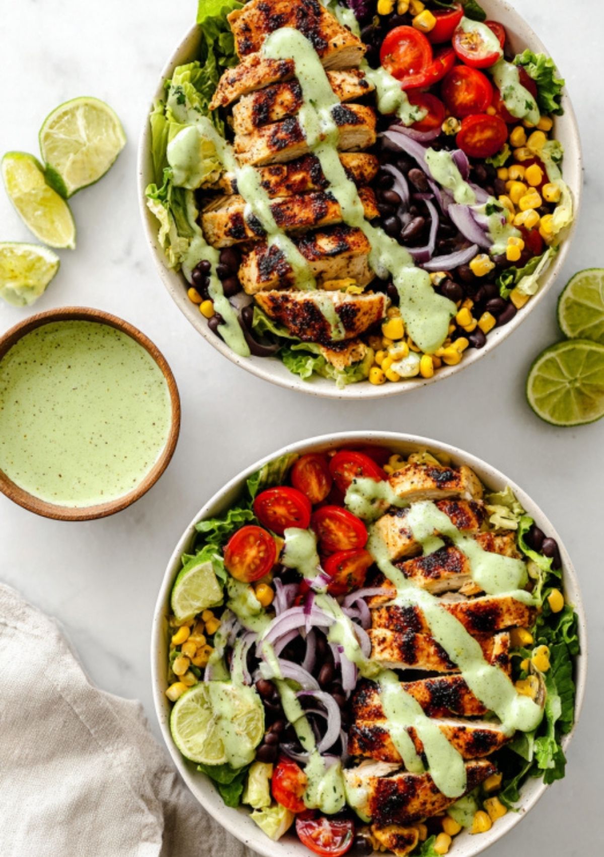 Southwest Chicken Salad topped with grilled chicken, veggies, and avocado ranch dressing, ready to eat