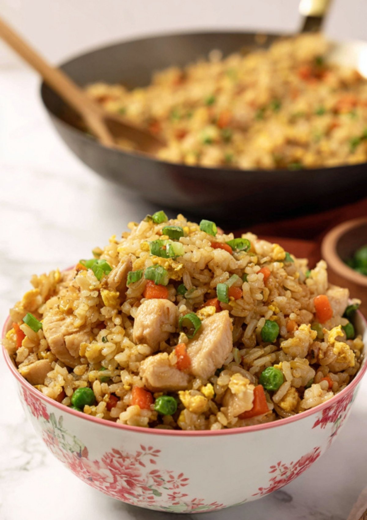 Classic chicken fried rice served in a decorative bowl, perfect for back-to-school meals and family nights.