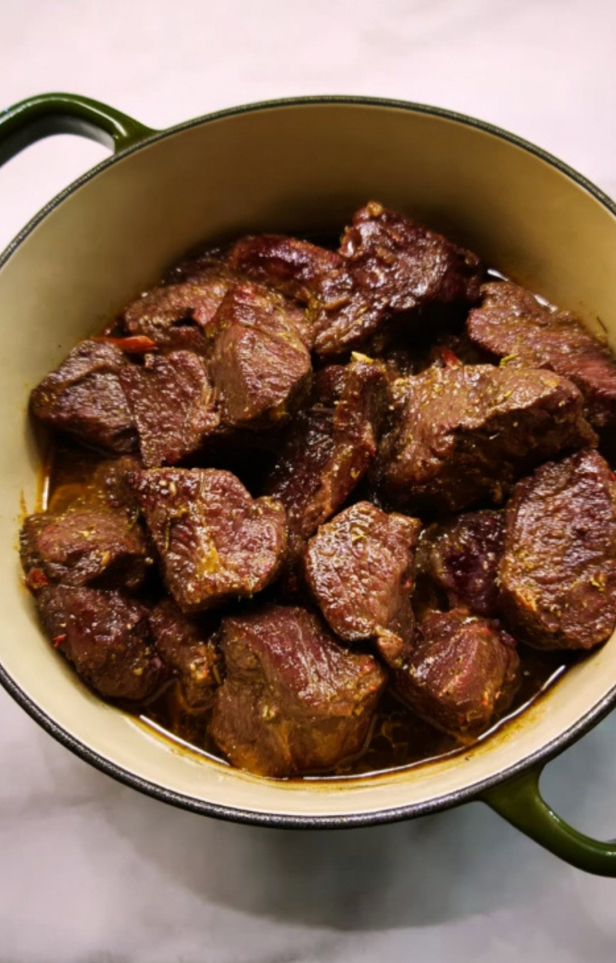 Tender beef pieces in a rich sauce after slow cooking. French beef stew ready to serve for special occasions or Sunday dinners.
