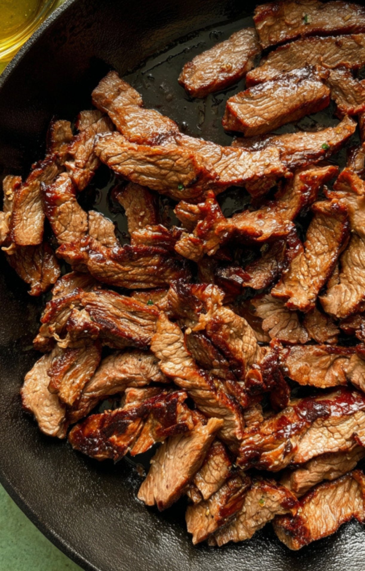 Tender shaved beef strips seared in a skillet, the perfect protein base for Shaved Beef And Broccoli stir fry.