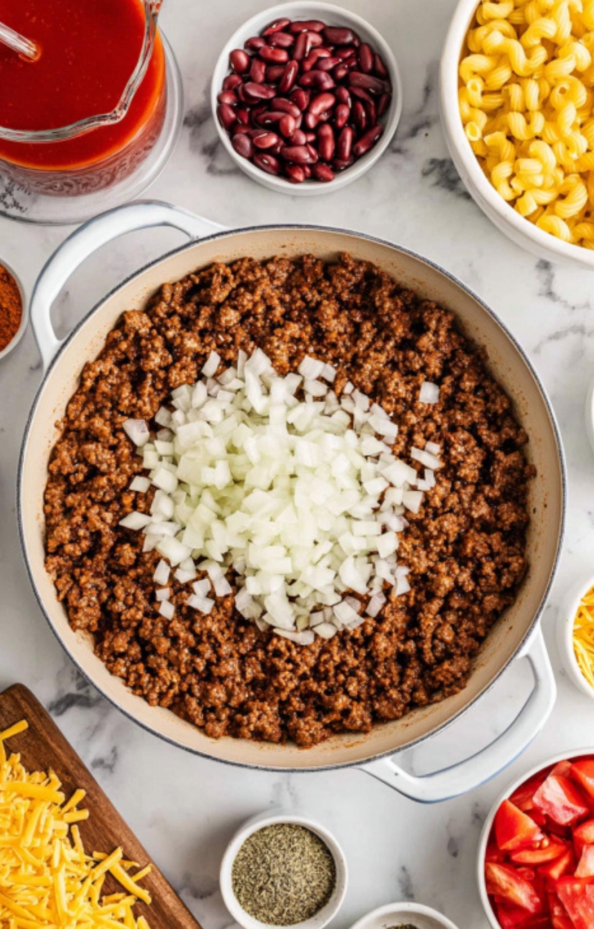Big pot of classic ground beef goulash simmering in tomato sauce for an easy, cozy dinner. Perfect for quick weeknight meals and comfort food lovers.