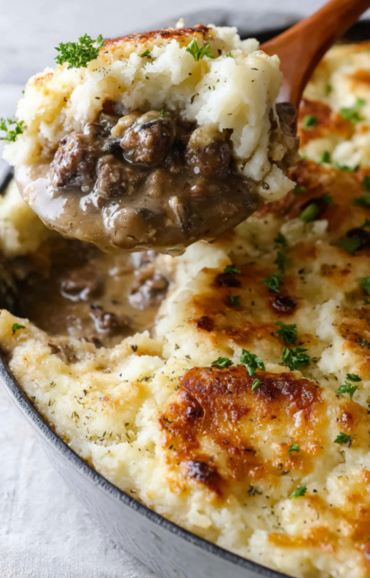 Ground beef and mushroom onion gravy combined in a skillet. This forms the base of a hearty Salisbury Steak Casserole recipe.