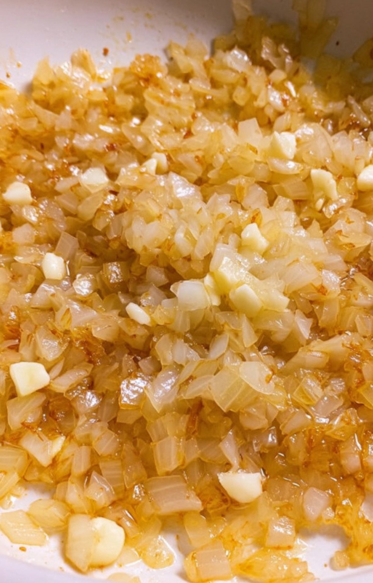 Golden sautéed onions and garlic in a skillet, building deep flavor for a classic comfort food pasta. Perfect starter for easy weeknight goulash.