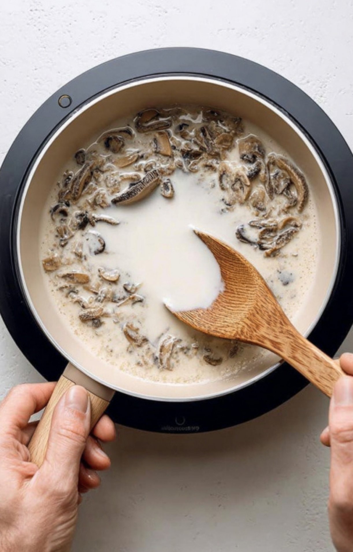 Homemade mushroom sauce simmering in a skillet, a flavorful topping for classic ground beef Wellington and easy weeknight dinners.
