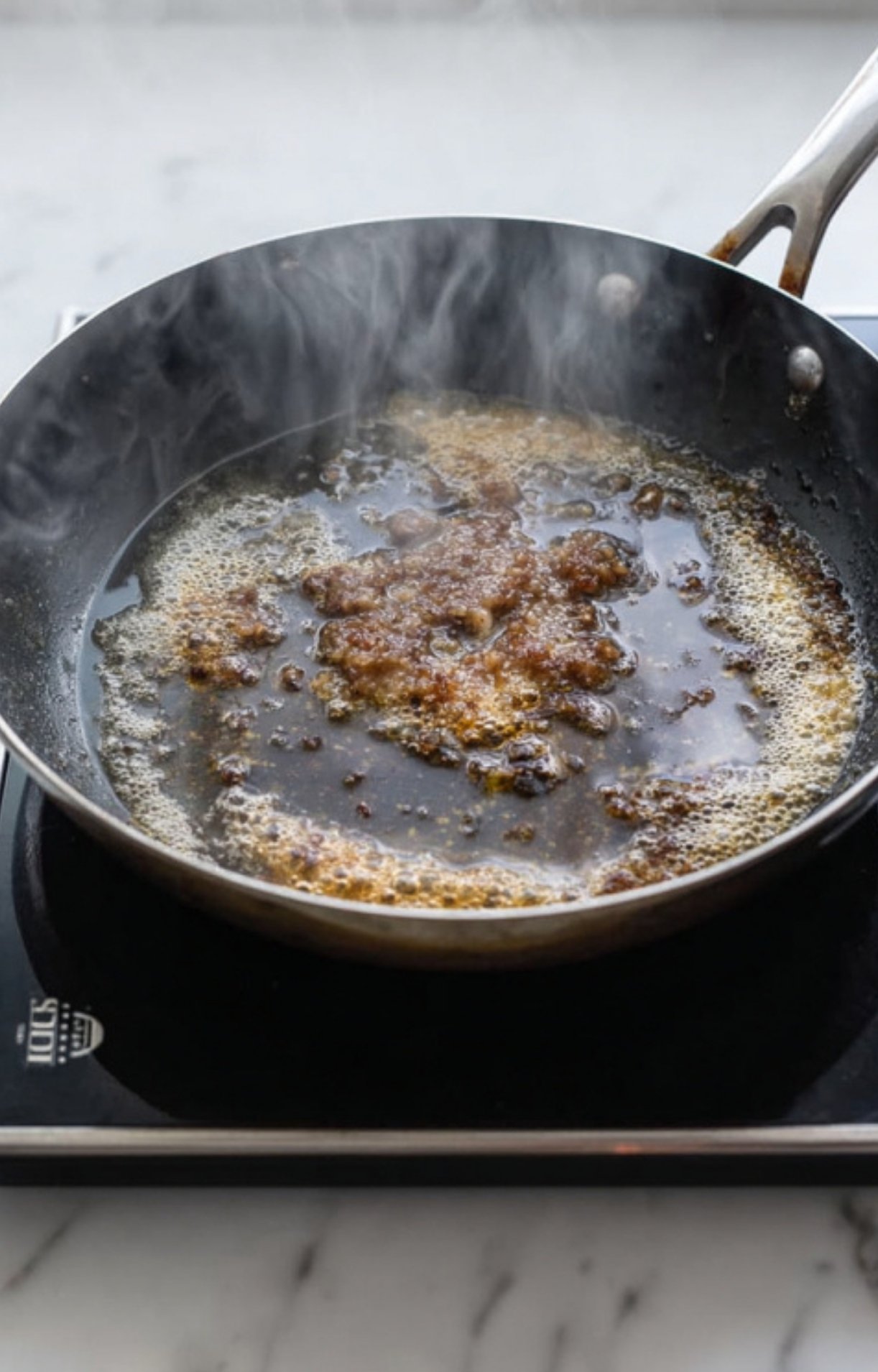 Sizzling browned bits in a hot skillet, the flavorful base for veal scallopini piccata pan sauce. Adds rich taste to Italian lemon butter sauce.