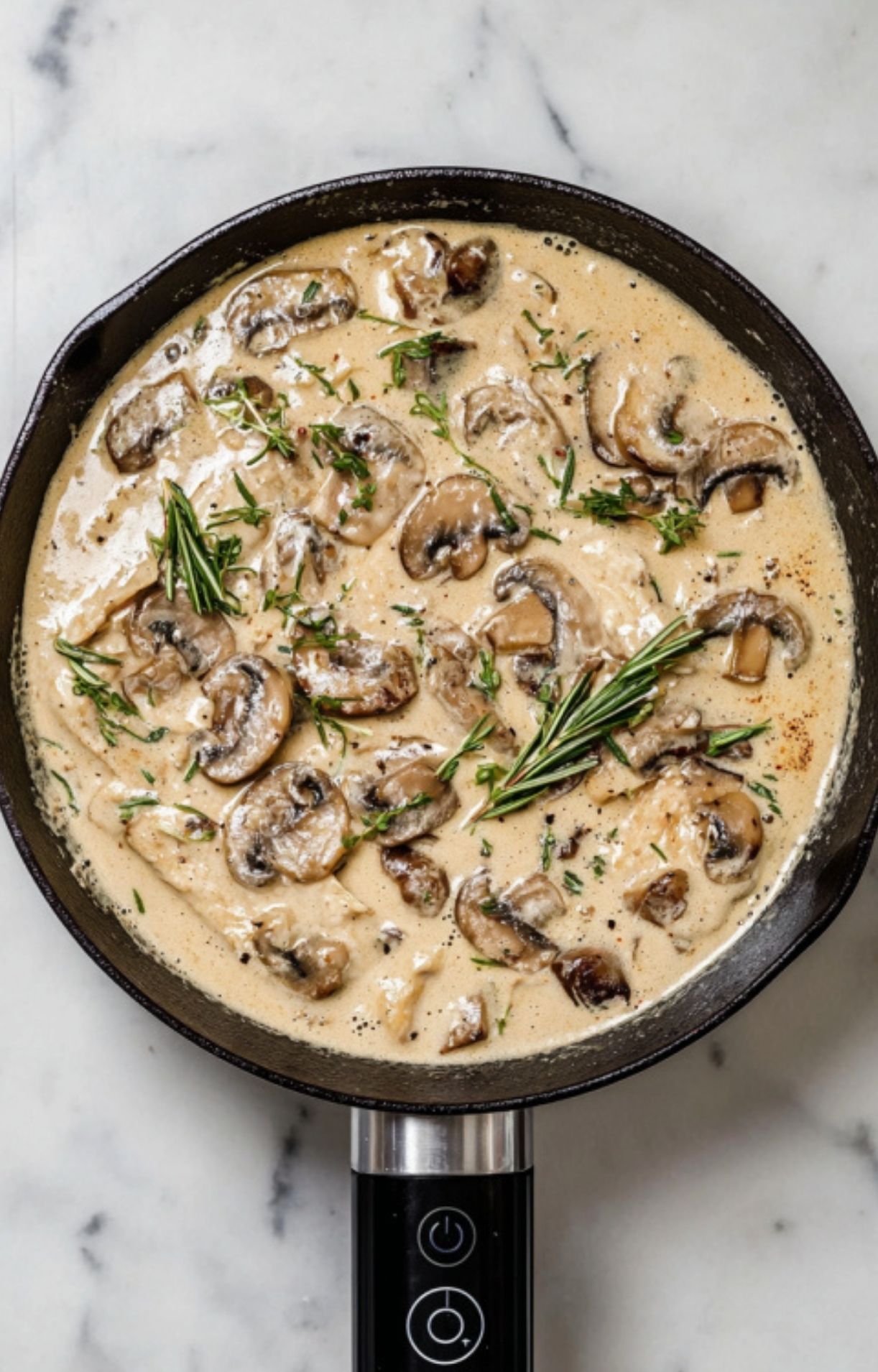 Tender veal cutlets in creamy mushroom and lemon sauce, garnished with parsley and fresh lemon slices for a classic Italian dinner.