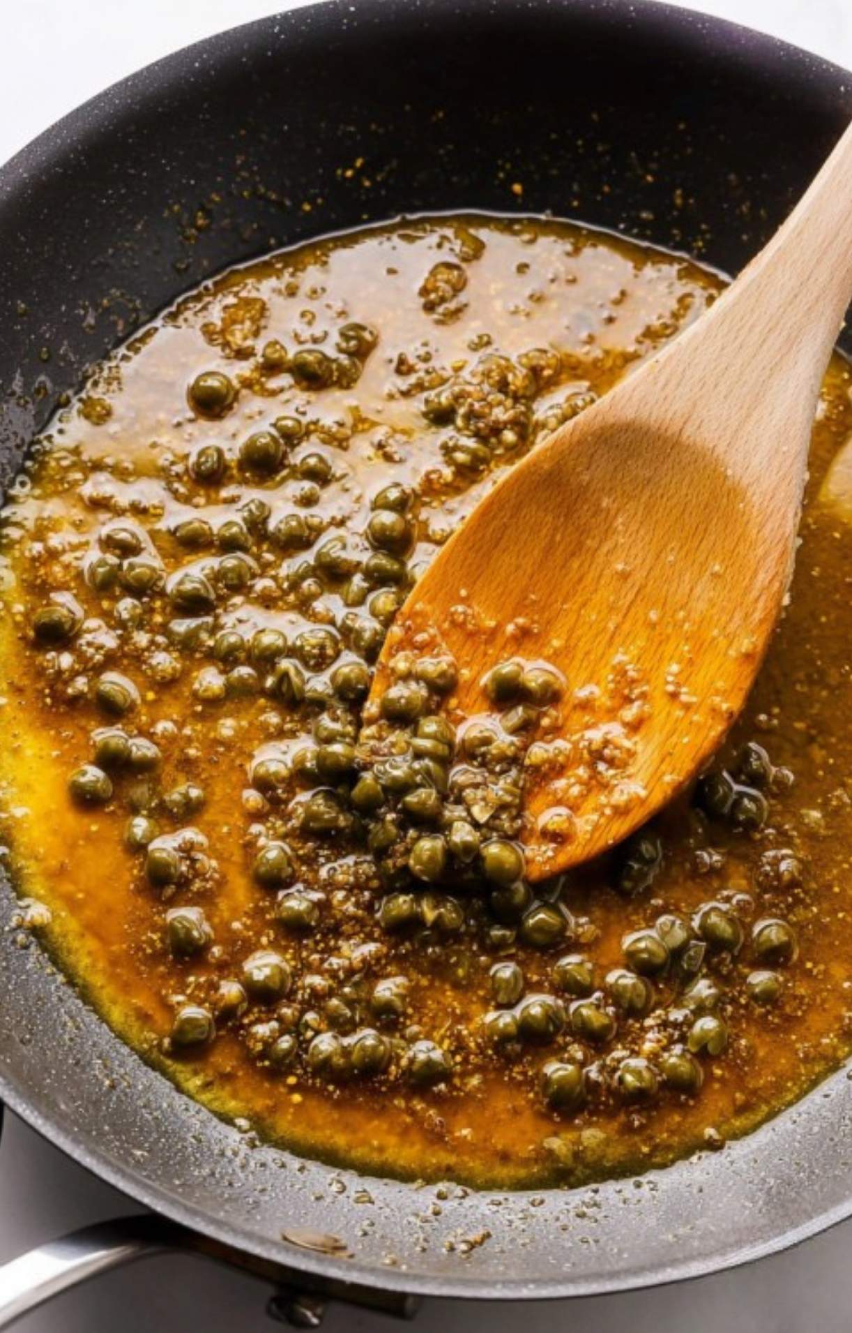Veal cutlets in lemon caper sauce, finished with fresh parsley. Perfect for Italian dinner.