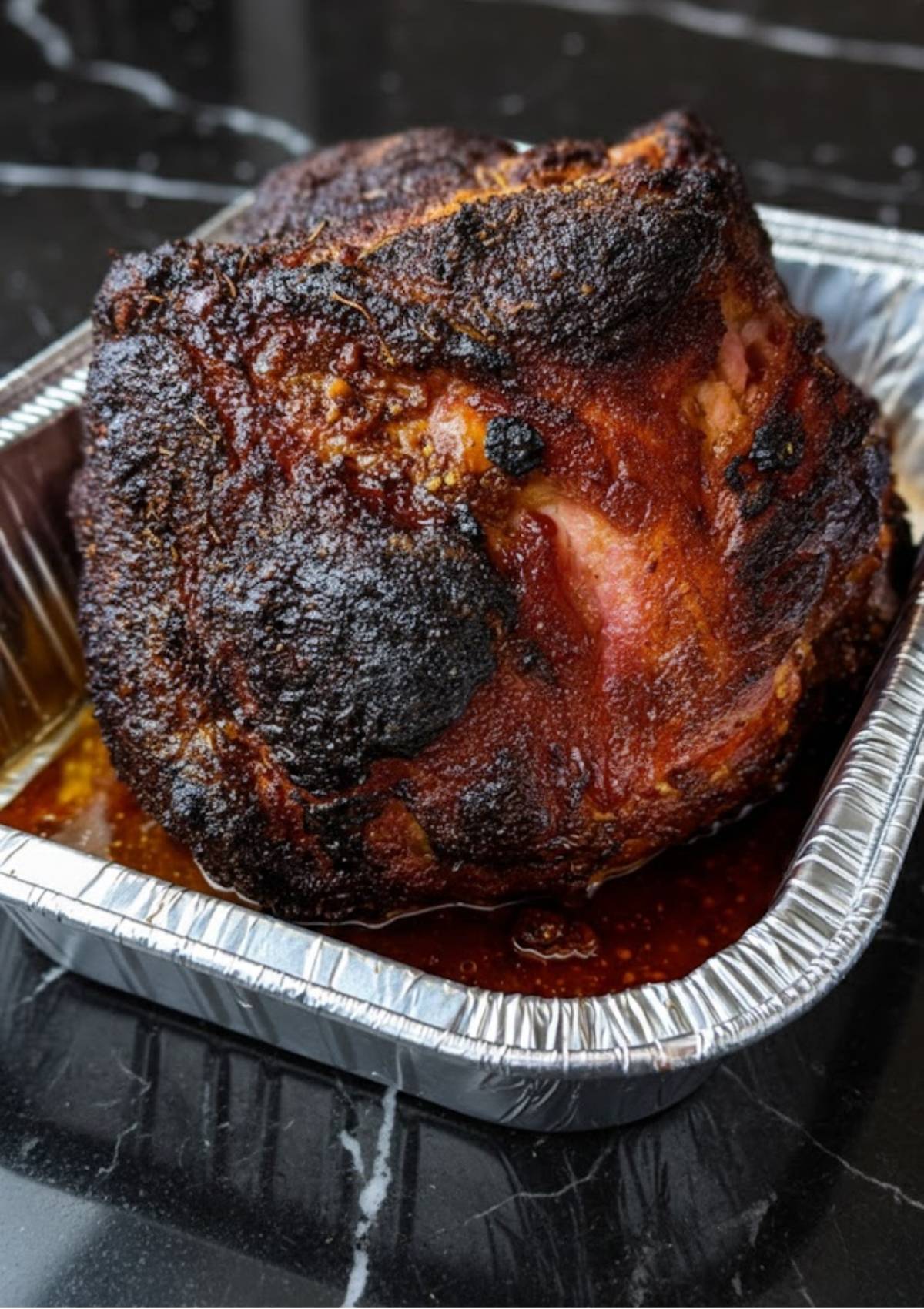 Smoked ham with sweet rub, rich caramelized crust from the grill