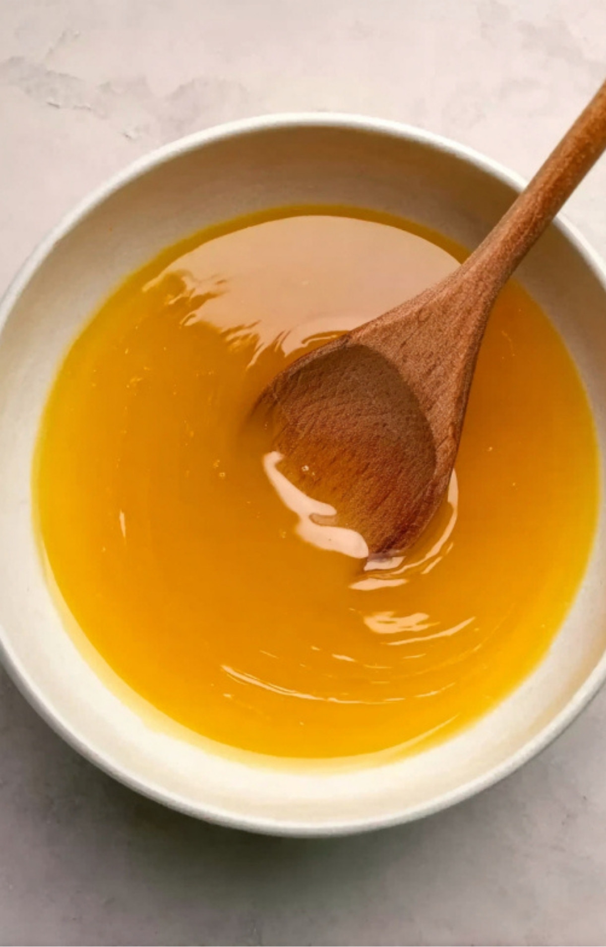 Sweet pineapple glaze for smoked precooked ham in a bowl