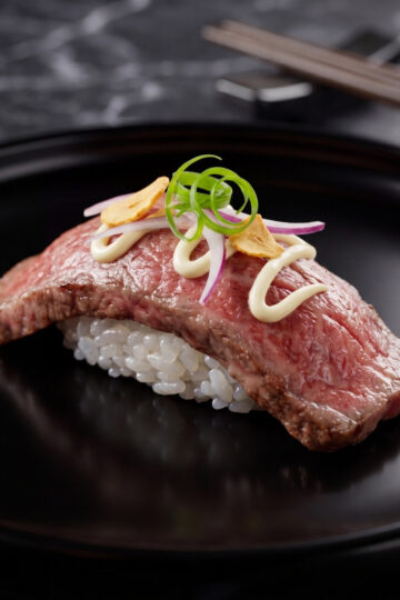wagyu beef slice on sushi rice with toppings for easy wagyu beef sushi recipe