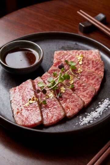 Japanese A5 wagyu beef recipe served sliced on plate with sauce gourmet steakhouse style luxury dinner idea