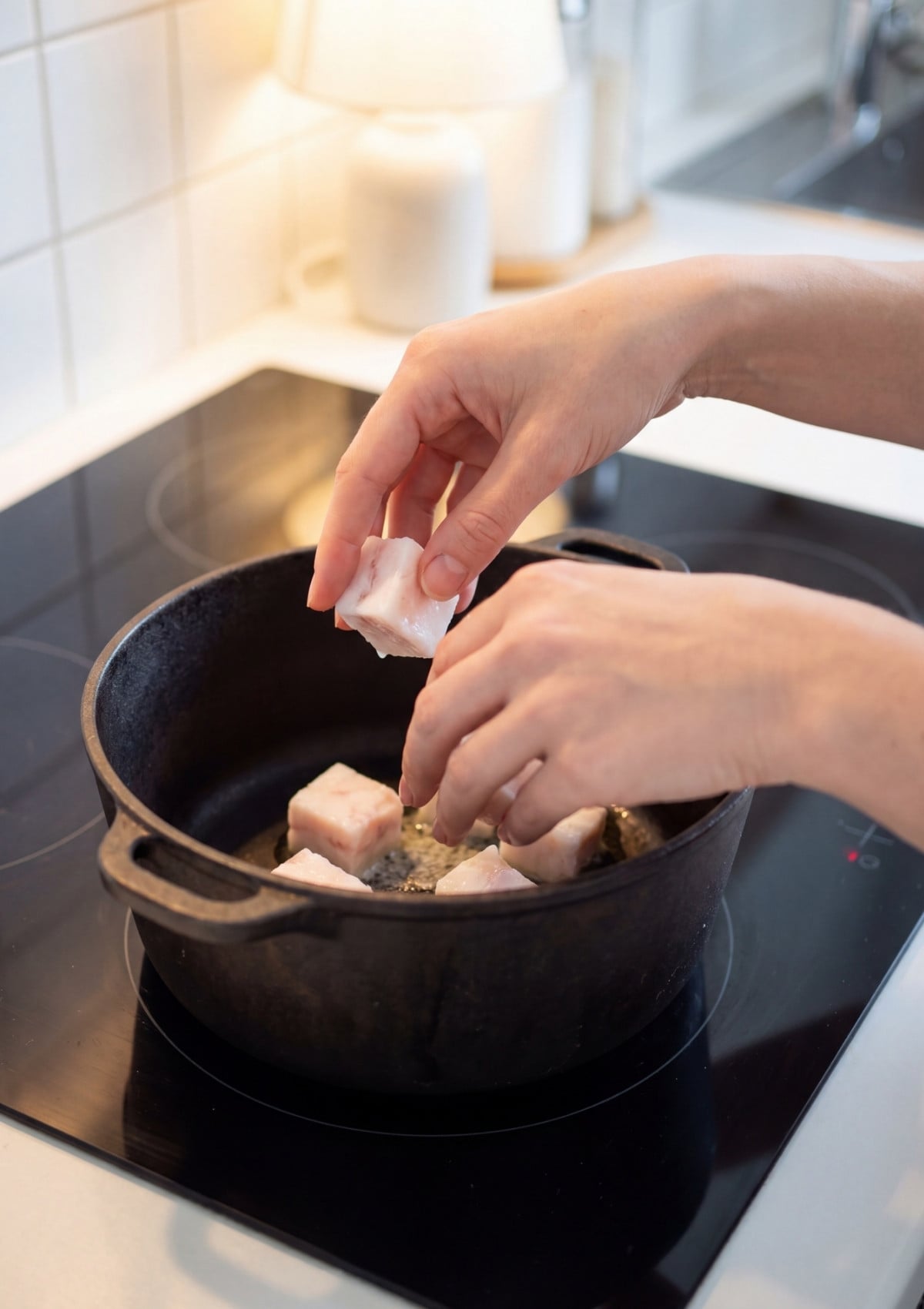 adding wagyu beef fat cubes into pot for wagyu beef tallow recipe step by step rendering process at home