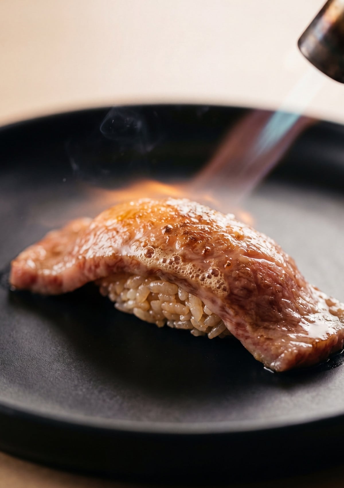 torch searing wagyu beef on sushi rice for easy wagyu beef sushi recipe flavor