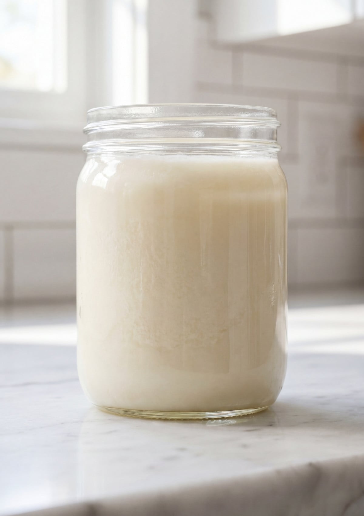 homemade wagyu beef tallow recipe stored in glass jar for cooking meal prep and keto recipes