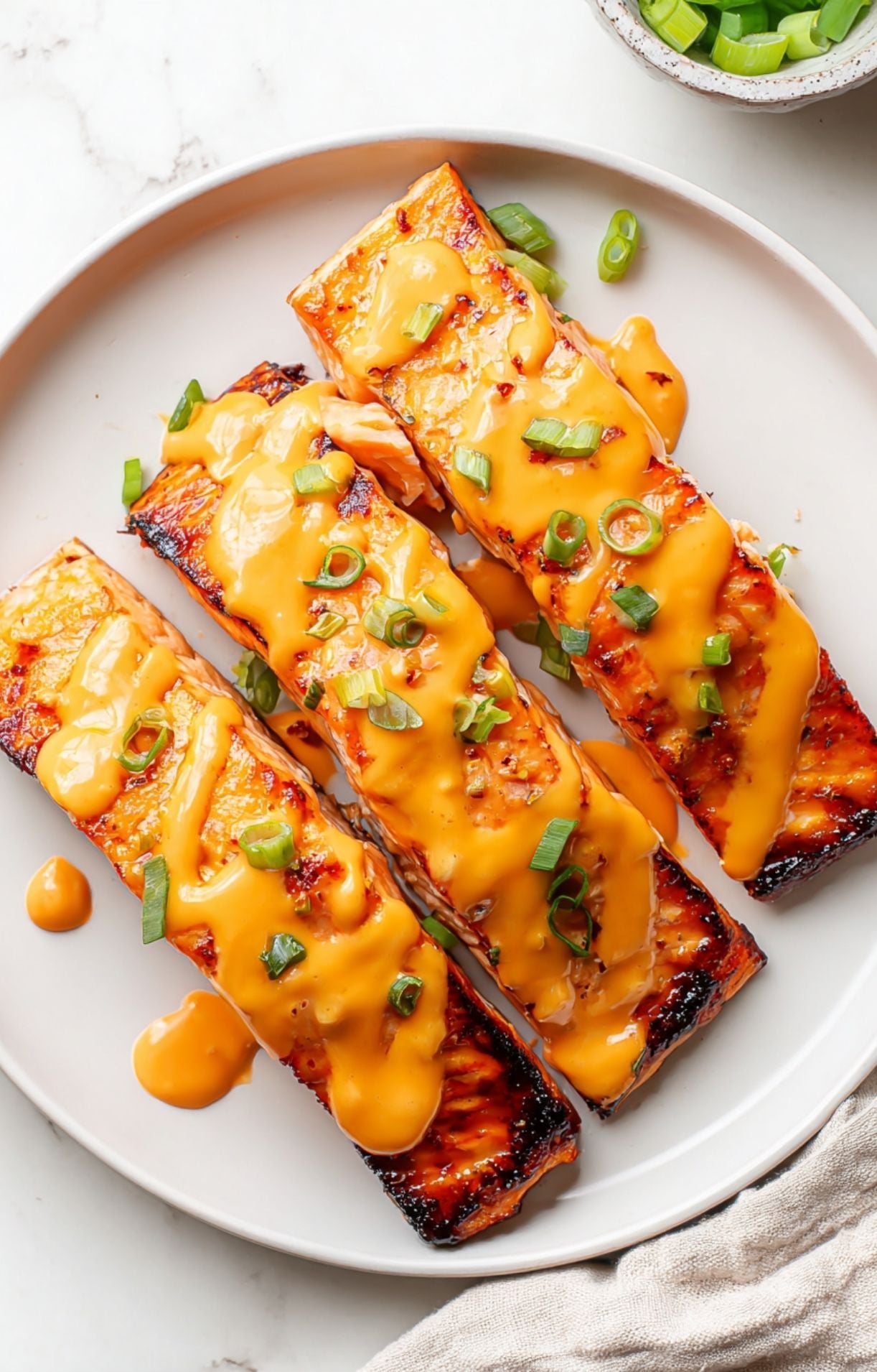 A close-up of the final dish showing the glossy texture of the spicy sauce.