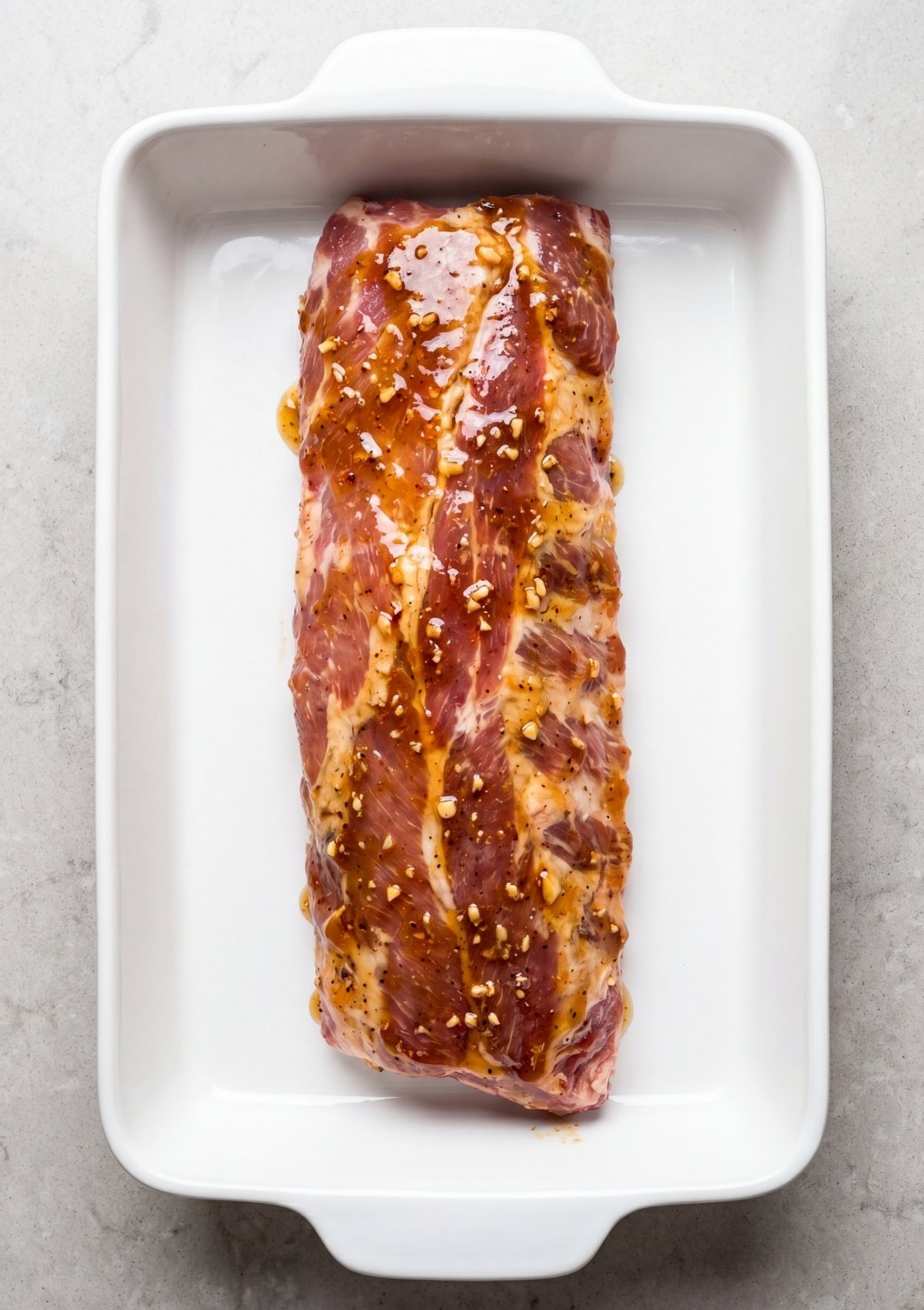 marinated pork ribs with sauce and garlic in dish best smoked ribs recipe pellet grill