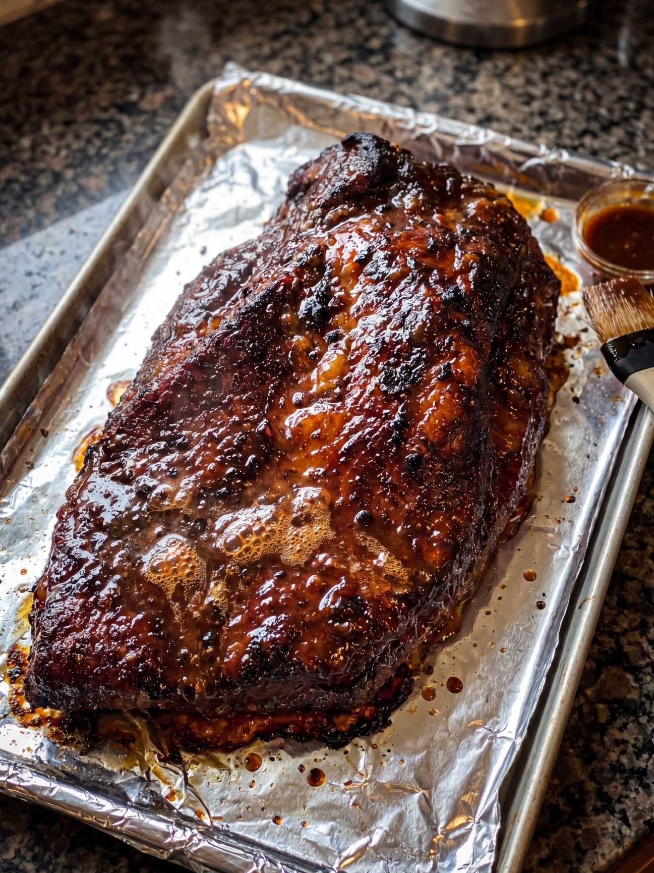 tender wagyu beef brisket recipe glazed brisket on tray with sauce caramelized finish step