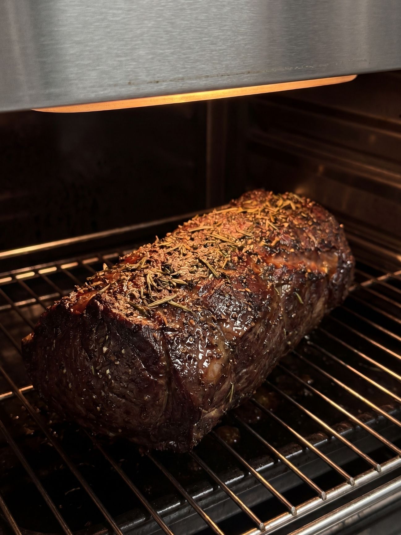 wagyu beef tenderloin recipe roasting in oven with herb crust golden finish